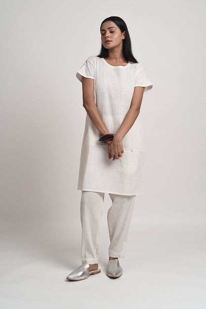 PINTUCKED IVORY TUNIC