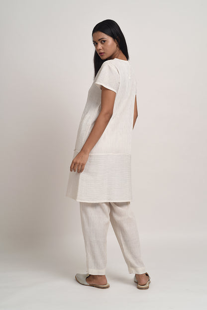 PINTUCKED IVORY TUNIC